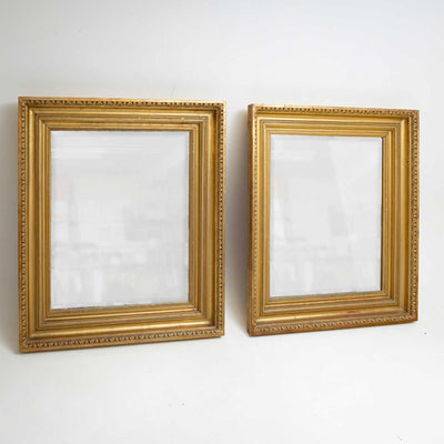 Pair of neoclassical Wall Mirrors, early 19th Century