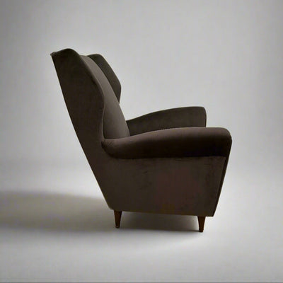 Single Italian Modernist wing chair in the style of Gio Ponti